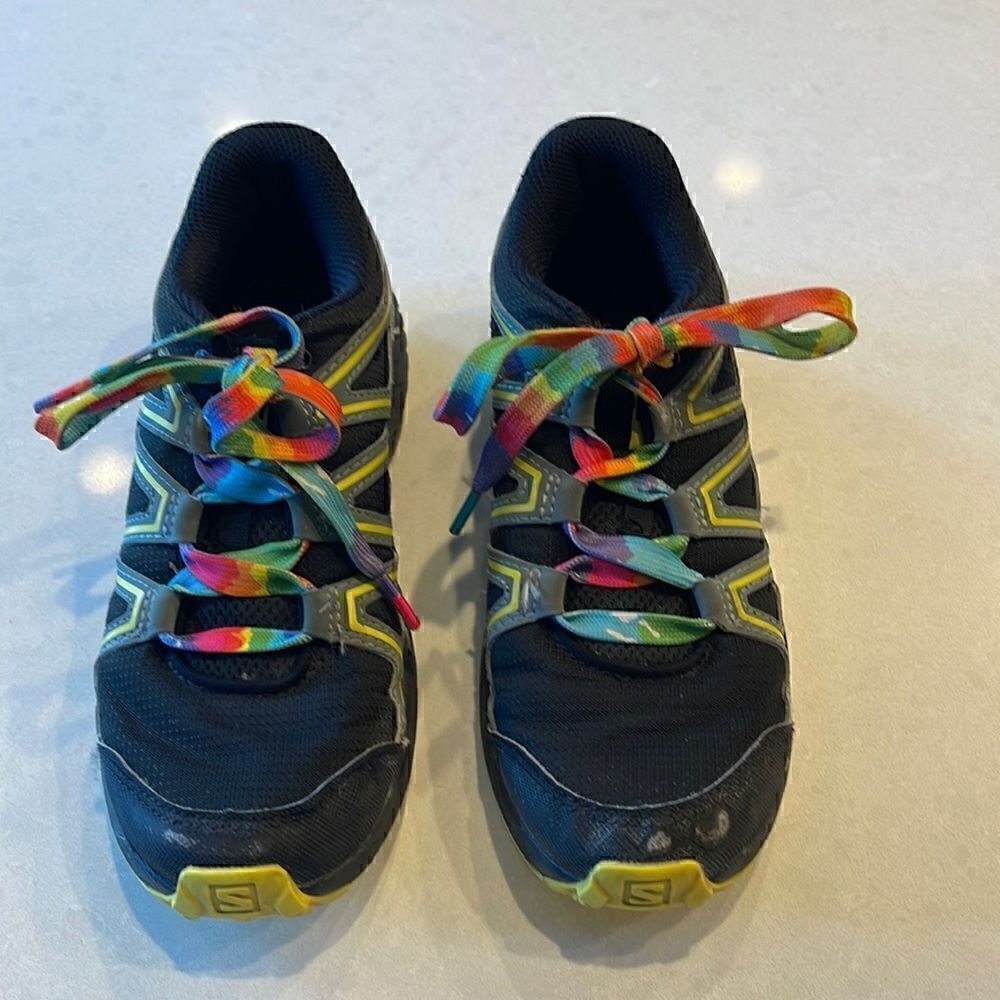 Salomon speed cross youth sneakers size 2 some wear on toe cosmetic no holes.